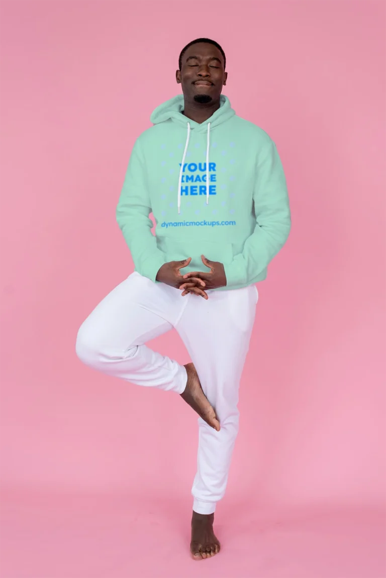 Man Wearing Mint Hoodie Mockup Front View Template