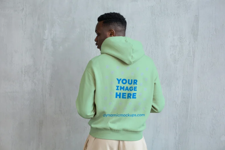 Man Wearing Mint Hoodie Mockup Back View Template