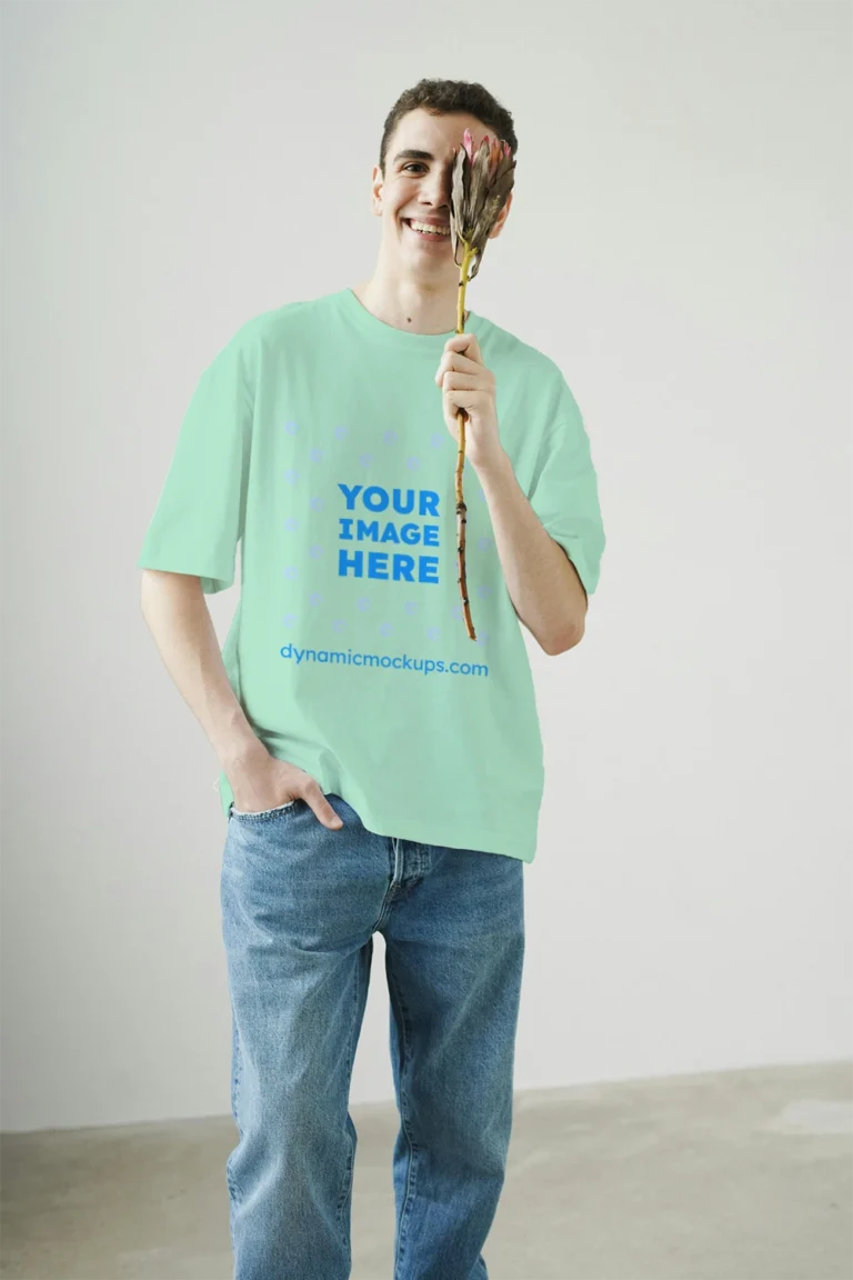 Man Wearing Mint T-shirt Mockup Front View Template