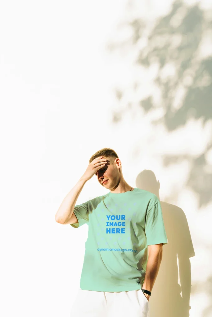 Man Wearing Mint T-shirt Mockup Front View Template