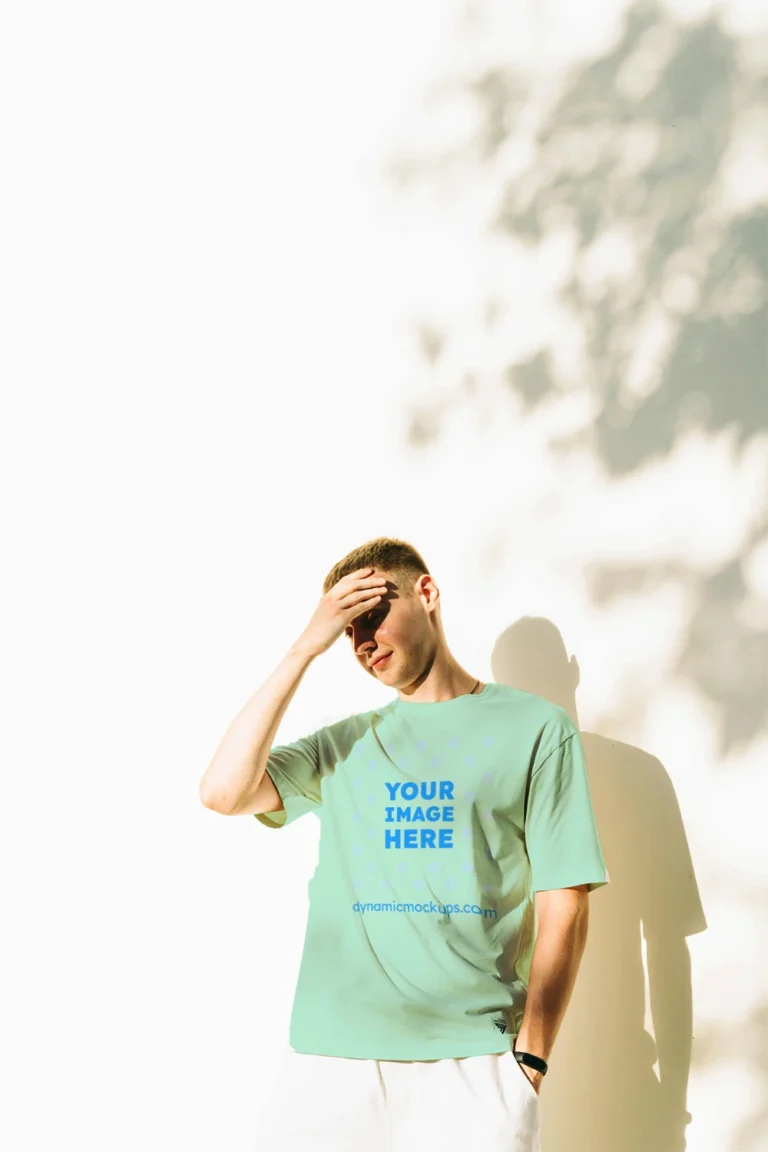 Man Wearing Mint T-shirt Mockup Front View Template