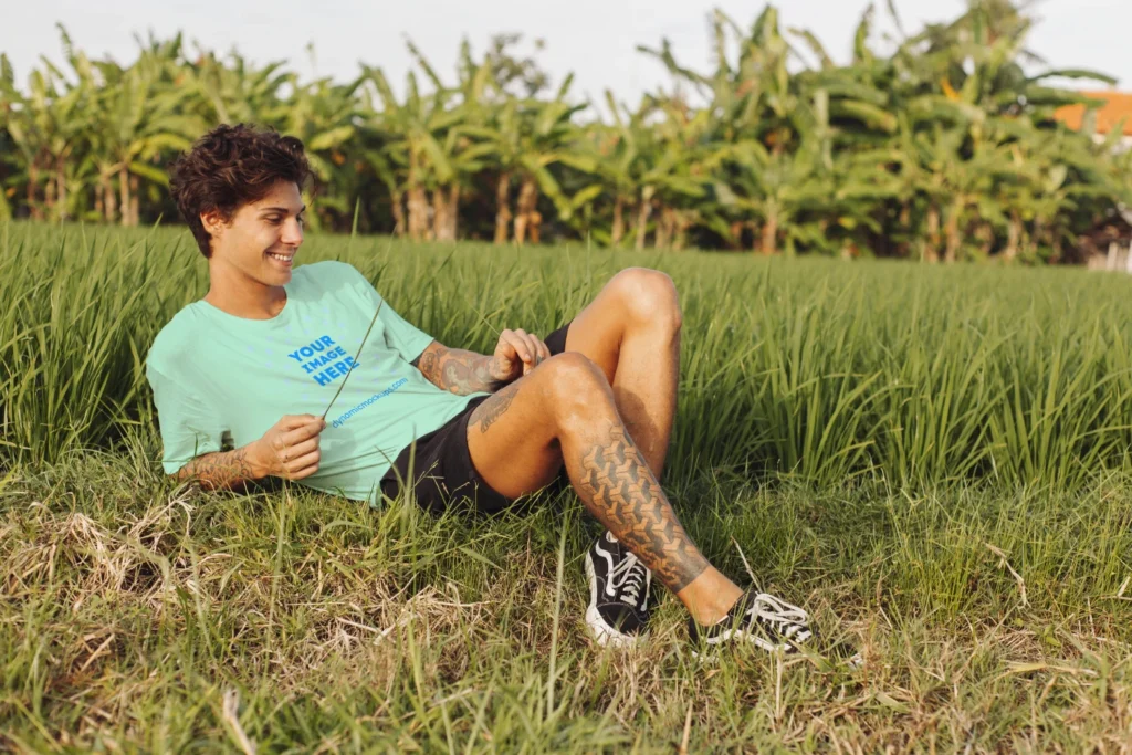 Man Wearing Mint T-shirt Mockup Front View Template