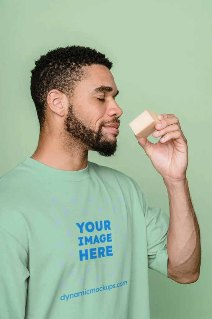 Man Wearing Mint T-shirt Mockup Front View Template