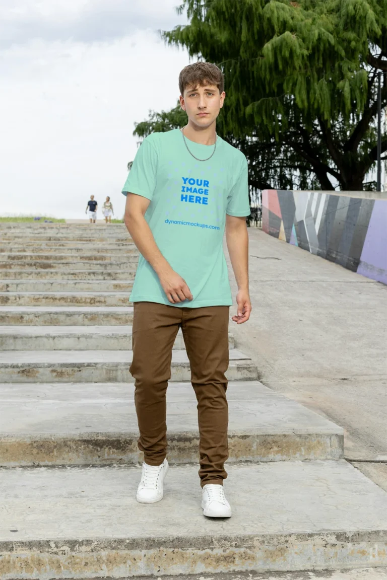 Man Wearing Mint T-shirt Mockup Front View Template