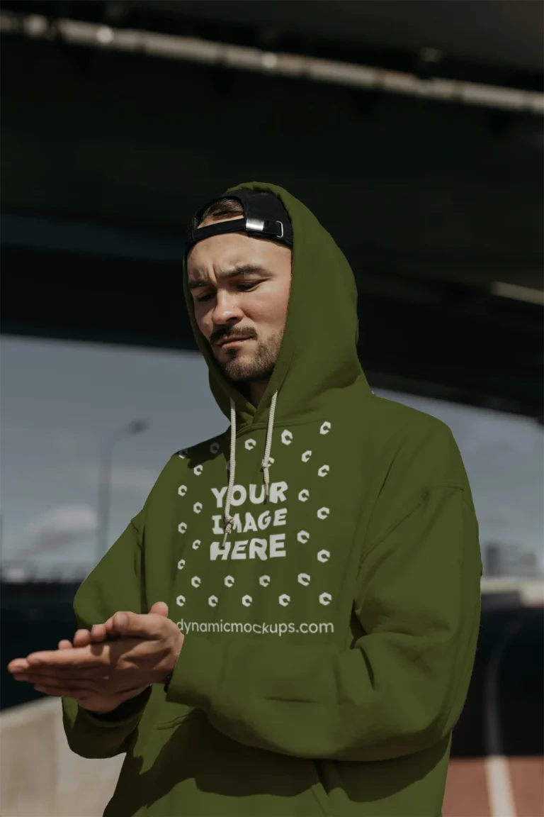 Man Wearing Olive Green Hoodie Mockup Front View Template