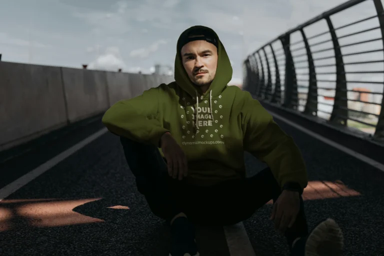 Man Wearing Olive Green Hoodie Mockup Front View Template