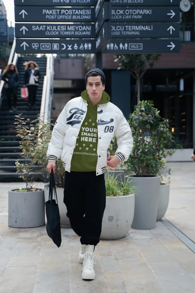 Man Wearing Olive Green Hoodie Mockup Front View Template