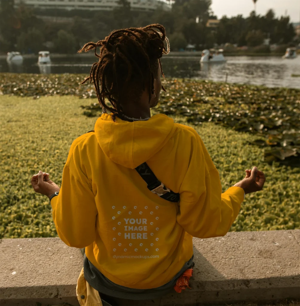 Man Wearing Orange Hoodie Mockup Back View Template