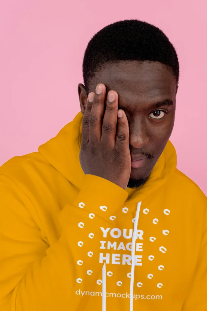 Man Wearing Orange Hoodie Mockup Front View Template