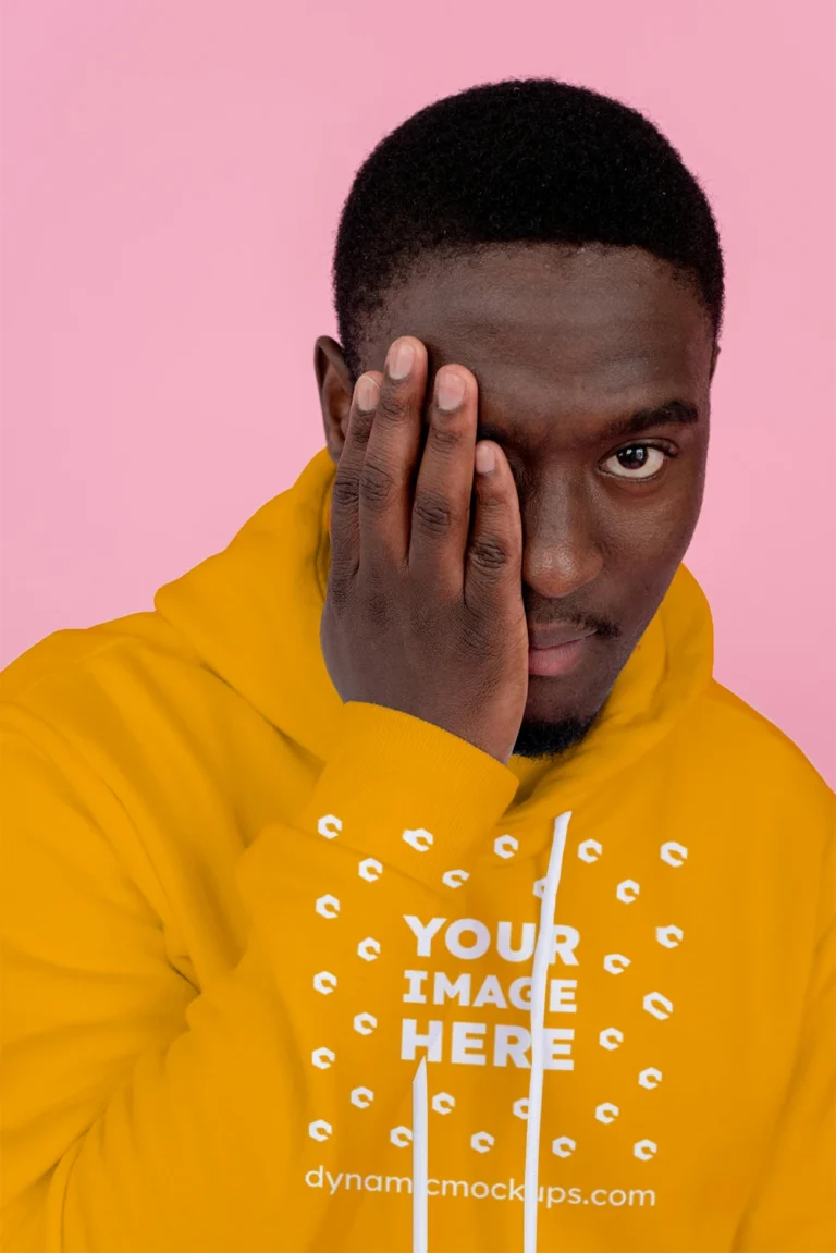 Man Wearing Orange Hoodie Mockup Front View Template