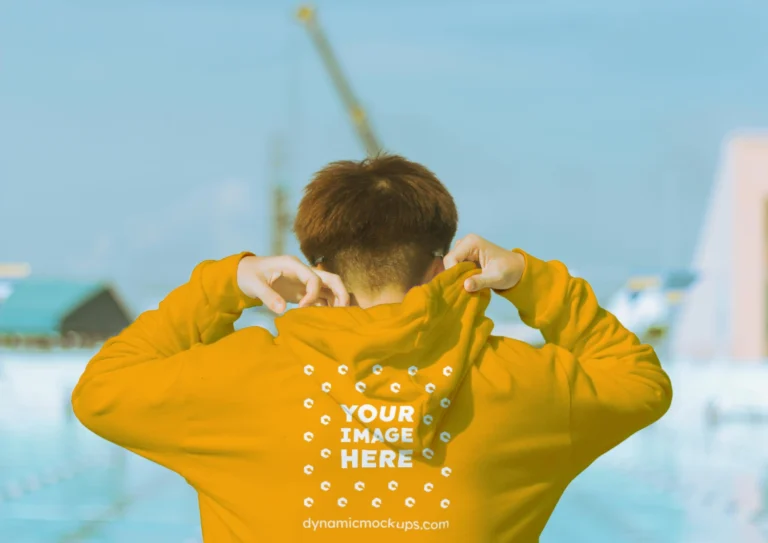Man Wearing Orange Hoodie Mockup Back View Template
