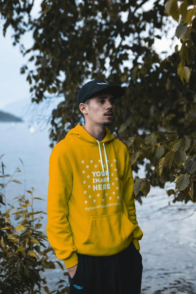 Man Wearing Orange Hoodie Mockup Front View Template