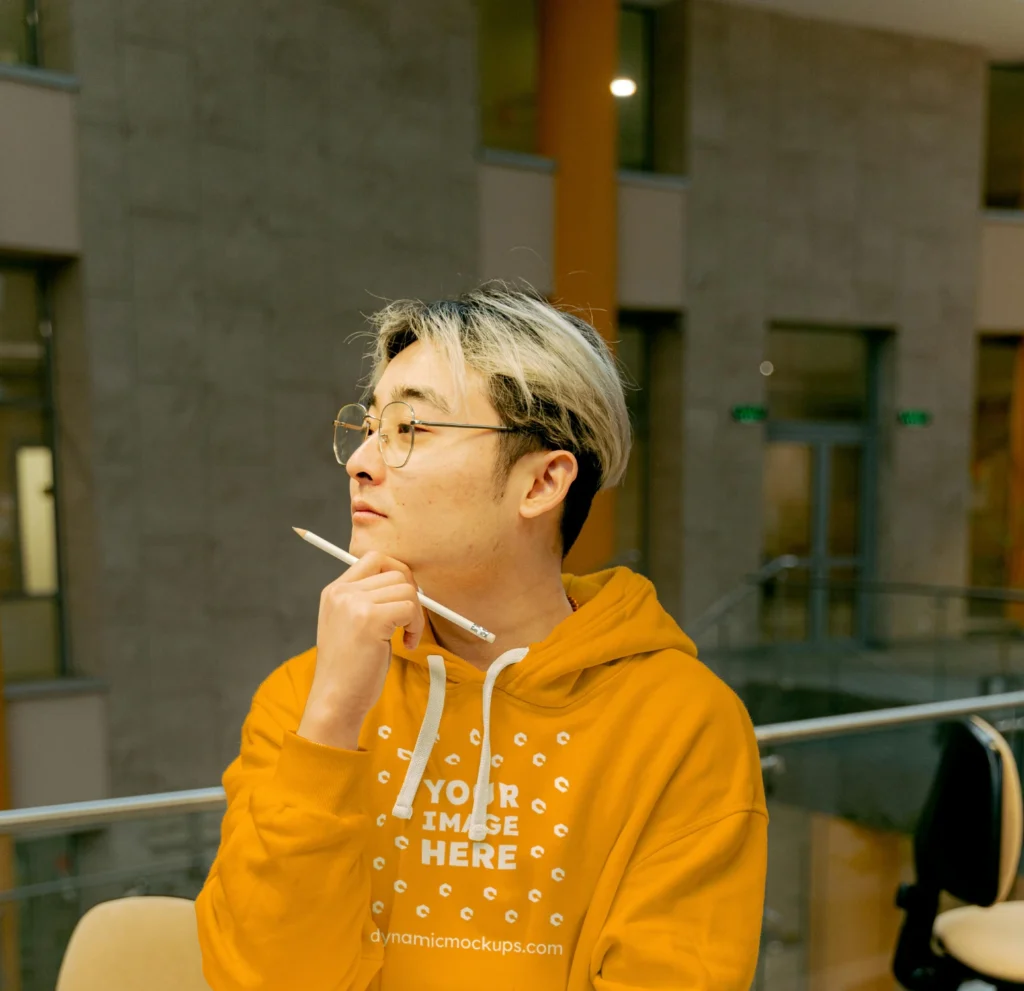 Man Wearing Orange Hoodie Mockup Front View Template