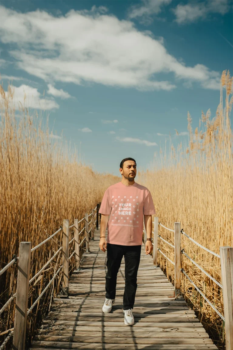 Man Wearing Peach T-shirt Mockup Front View Template