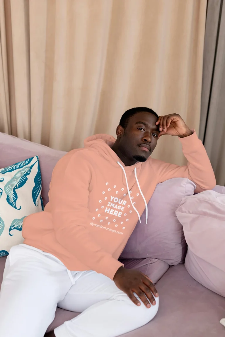Man Wearing Peach Hoodie Mockup Front View Template