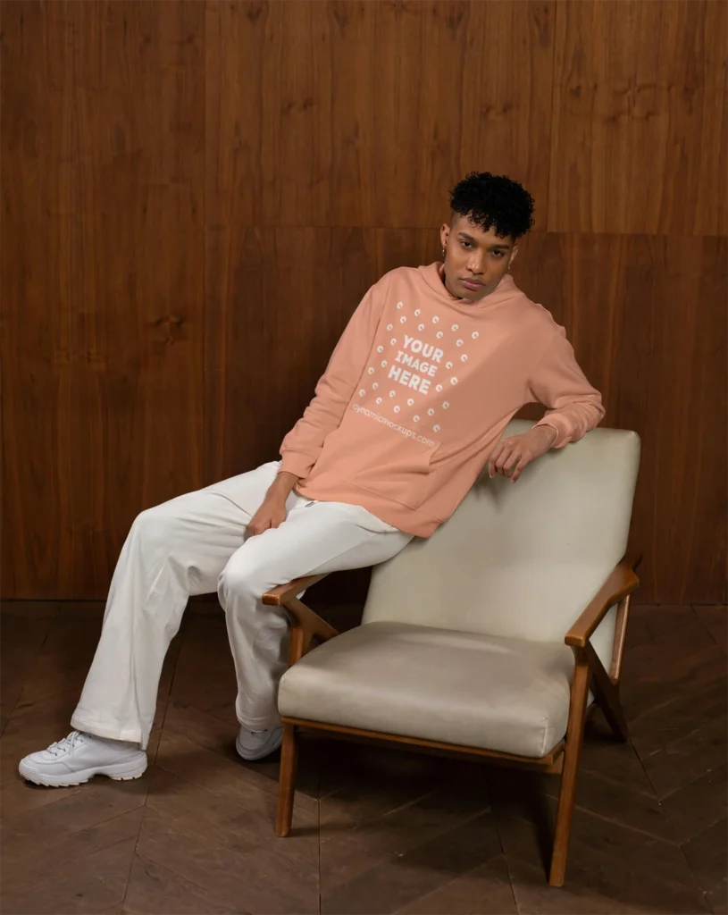 Man Wearing Peach Hoodie Mockup Front View Template