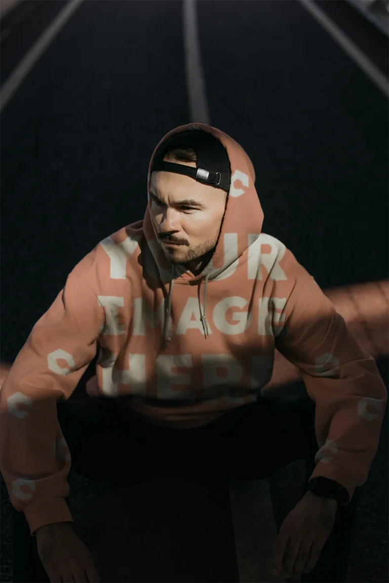 Man Wearing Peach Hoodie Mockup Front View Template