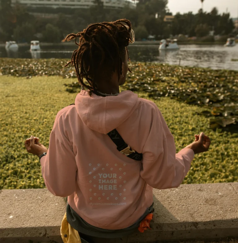Man Wearing Peach Hoodie Mockup Back View Template
