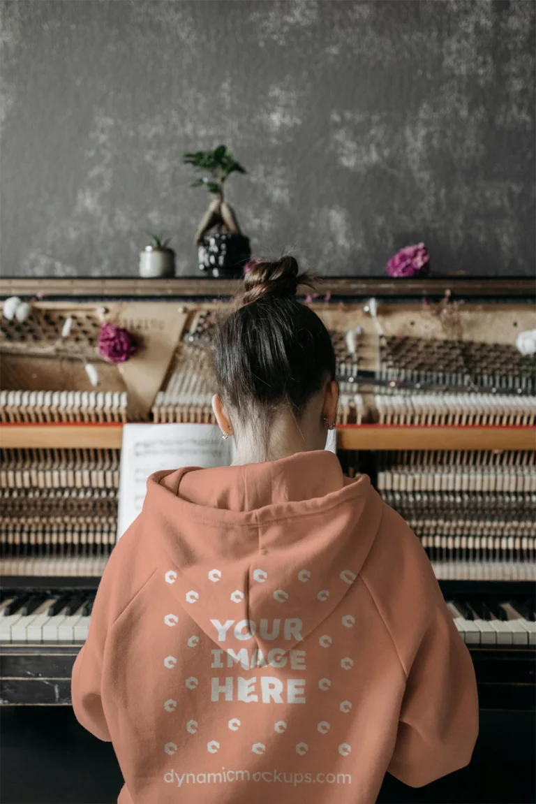 Man Wearing Peach Hoodie Mockup Back View Template