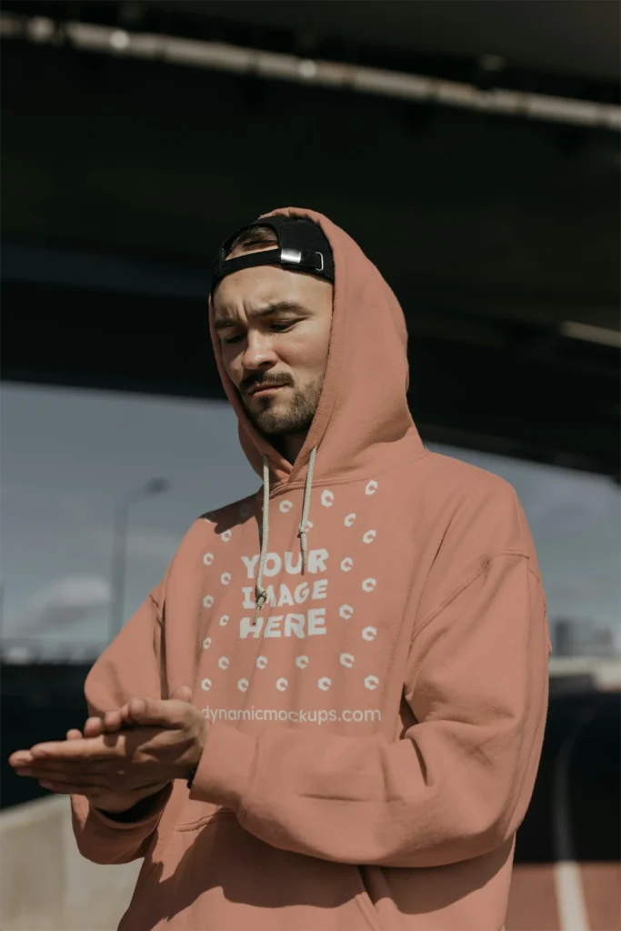 Man Wearing Peach Hoodie Mockup Front View Template