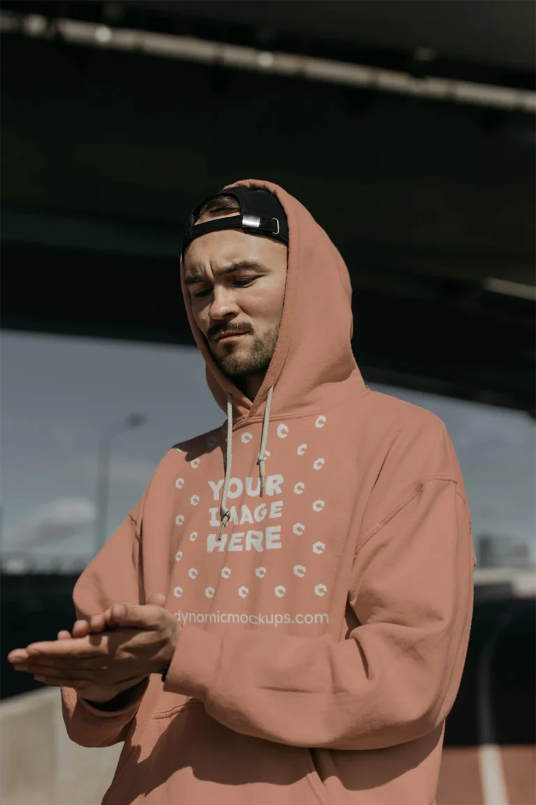 Man Wearing Peach Hoodie Mockup Front View Template