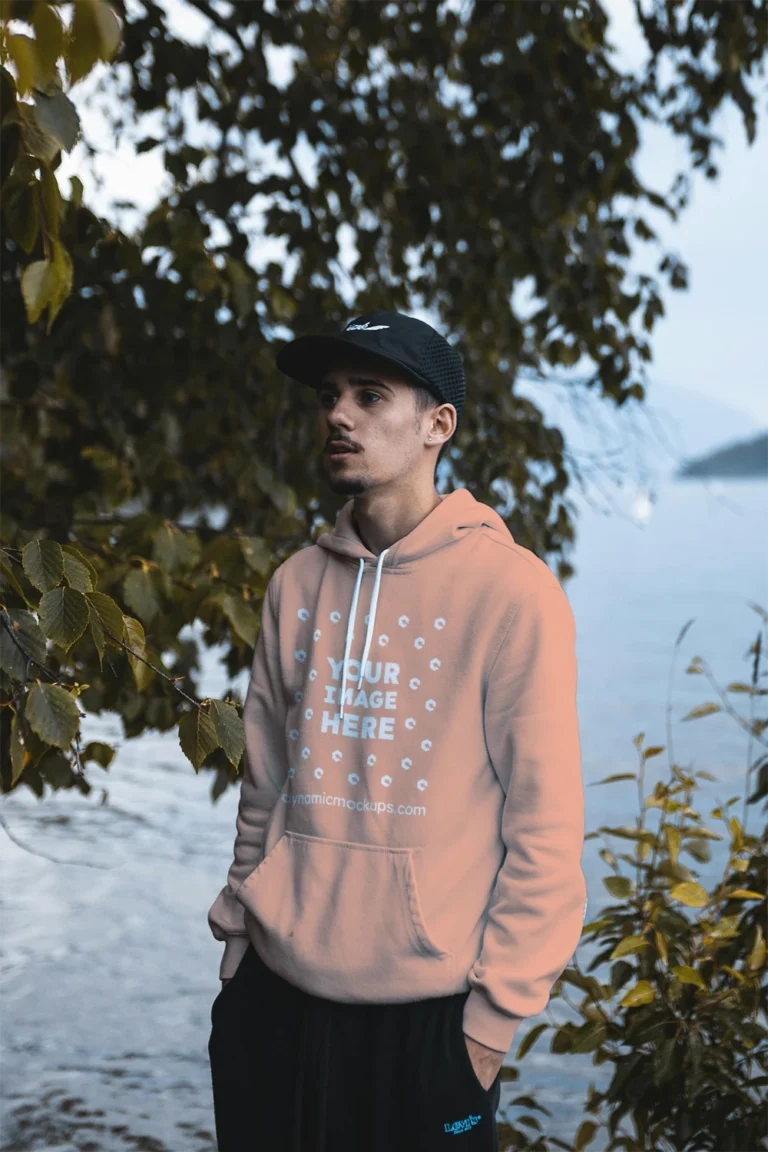 Man Wearing Peach Hoodie Mockup Front View Template