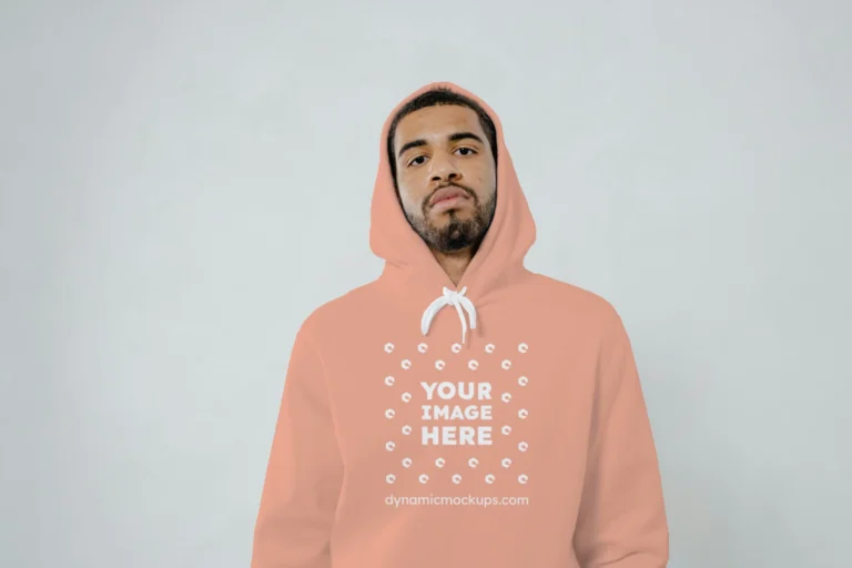 Man Wearing Peach Hoodie Mockup Front View Template