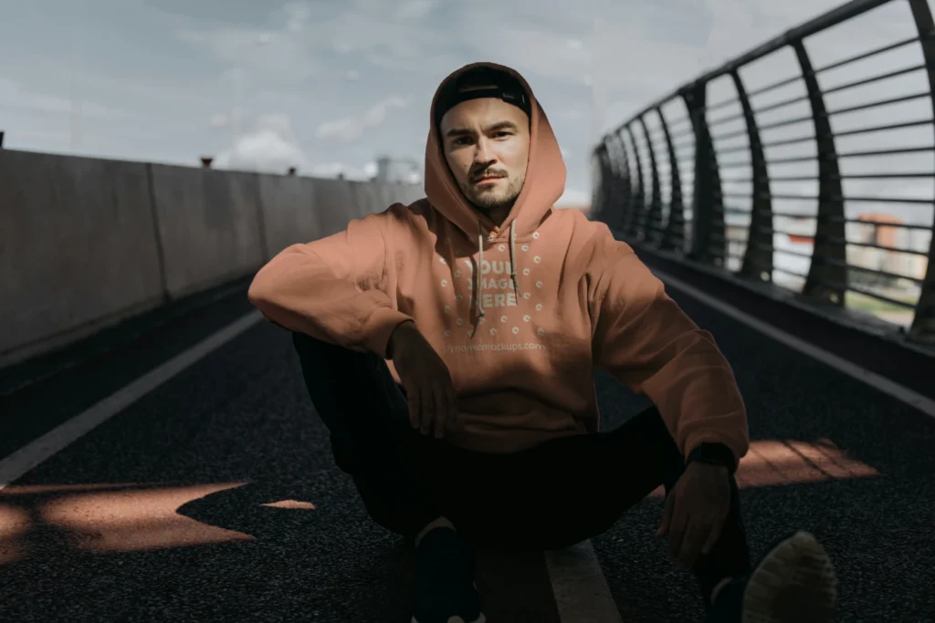 Man Wearing Peach Hoodie Mockup Front View Template