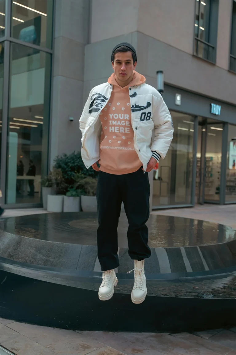 Man Wearing Peach Hoodie Mockup Front View Template