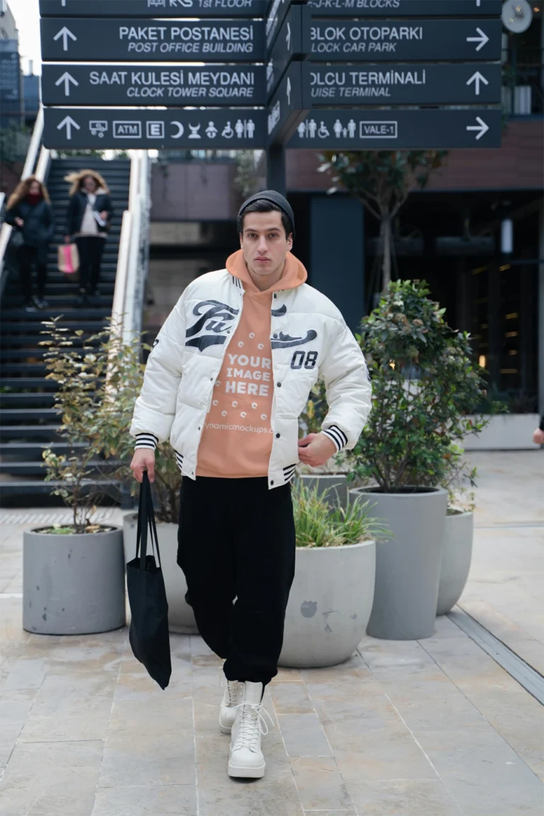 Man Wearing Peach Hoodie Mockup Front View Template