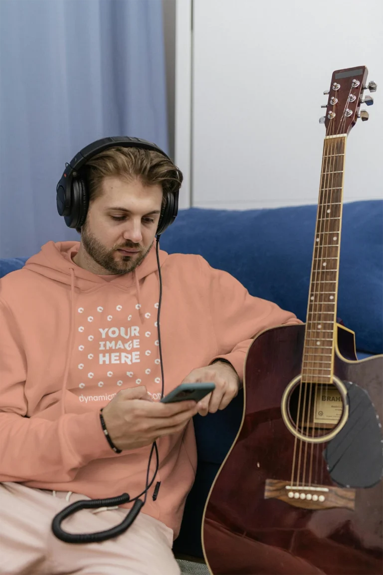 Man Wearing Peach Hoodie Mockup Front View Template