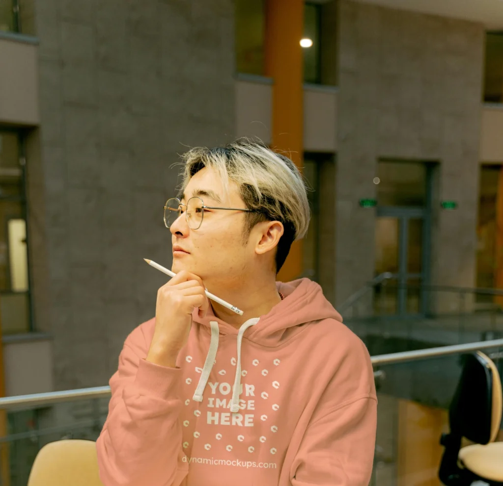 Man Wearing Peach Hoodie Mockup Front View Template