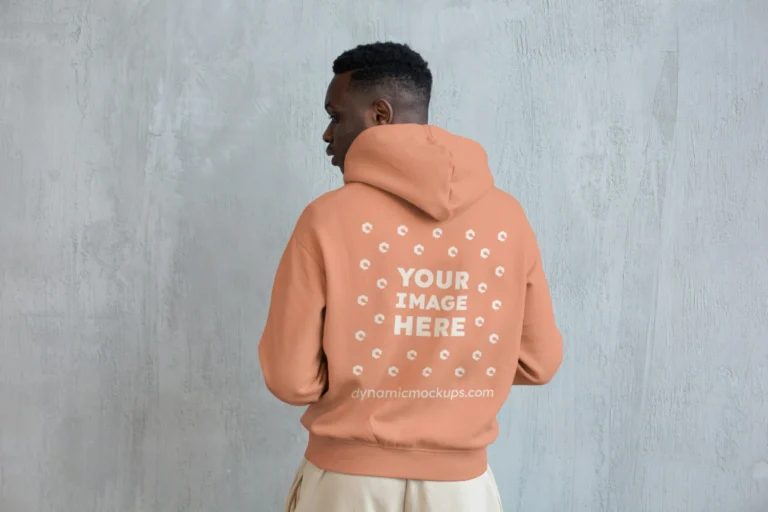 Man Wearing Peach Hoodie Mockup Back View Template