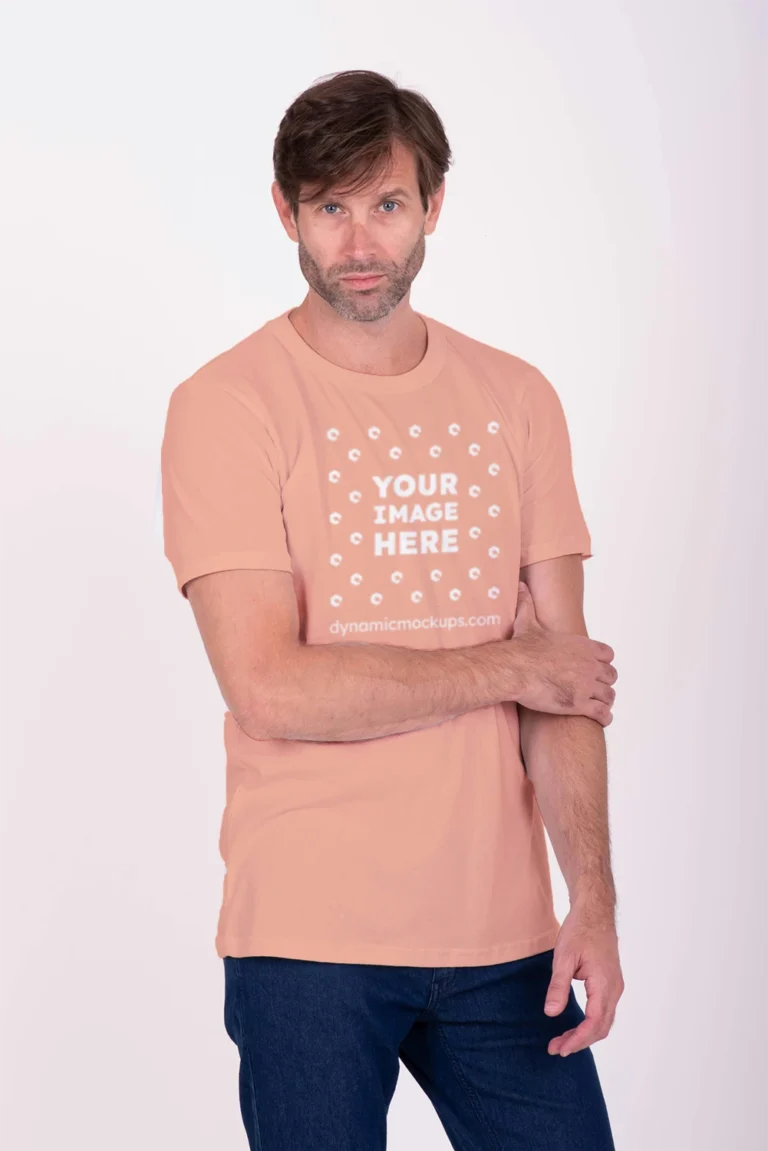 Man Wearing Peach T-shirt Mockup Front View Template