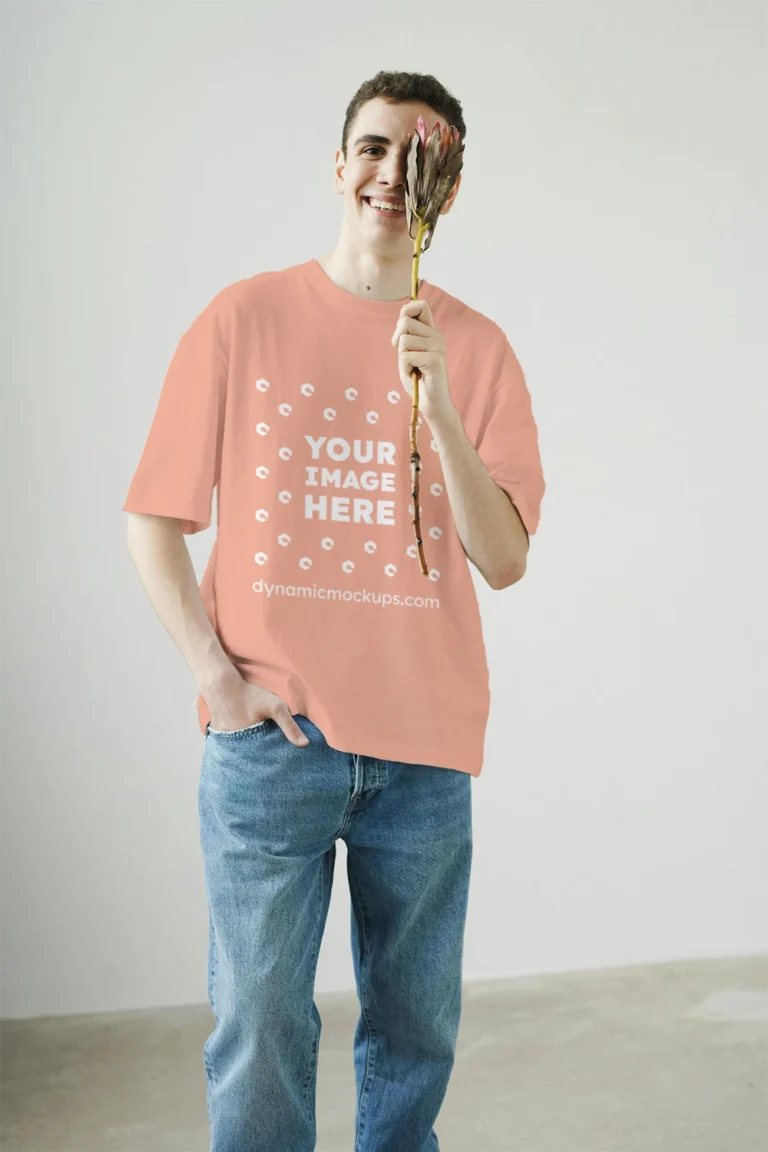 Man Wearing Peach T-shirt Mockup Front View Template