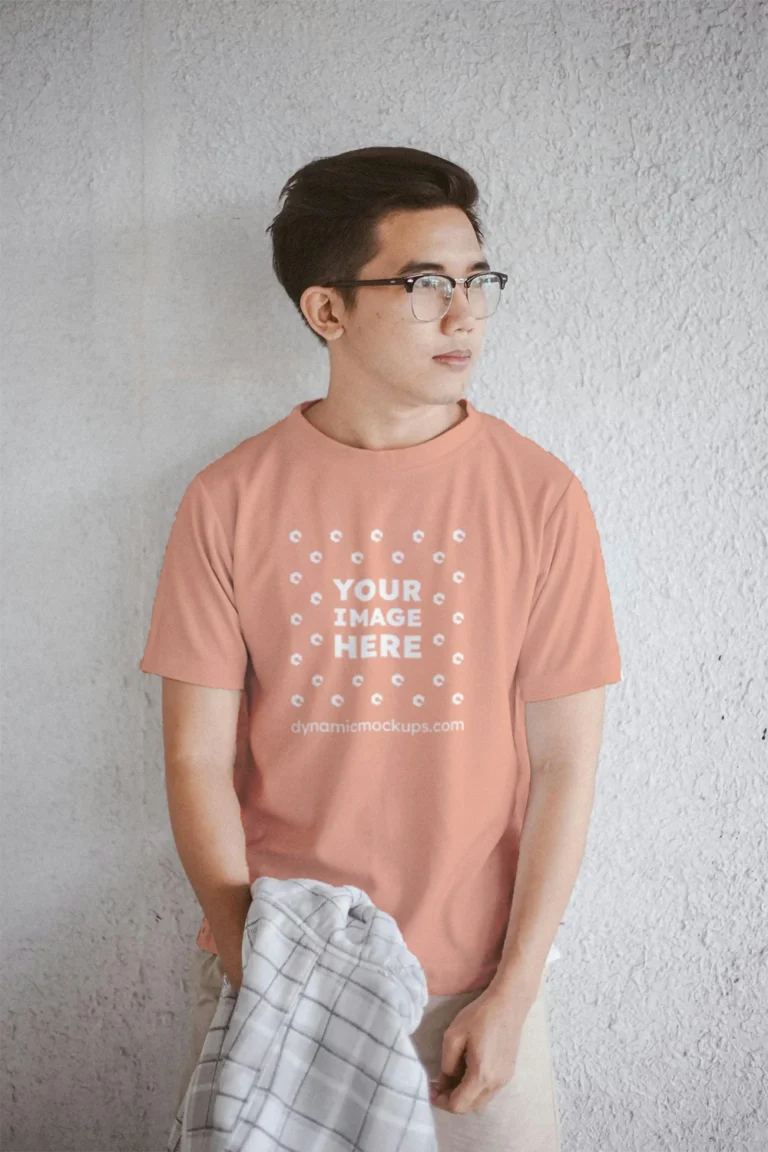 Man Wearing Peach T-shirt Mockup Front View Template