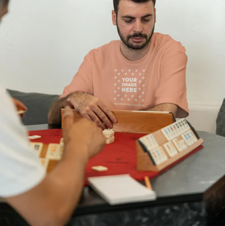 Man Wearing Peach T-shirt Mockup Front View Template