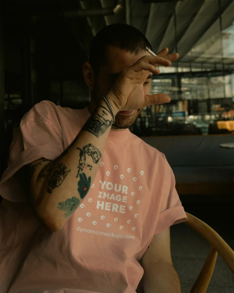 Man Wearing Peach T-shirt Mockup Front View Template
