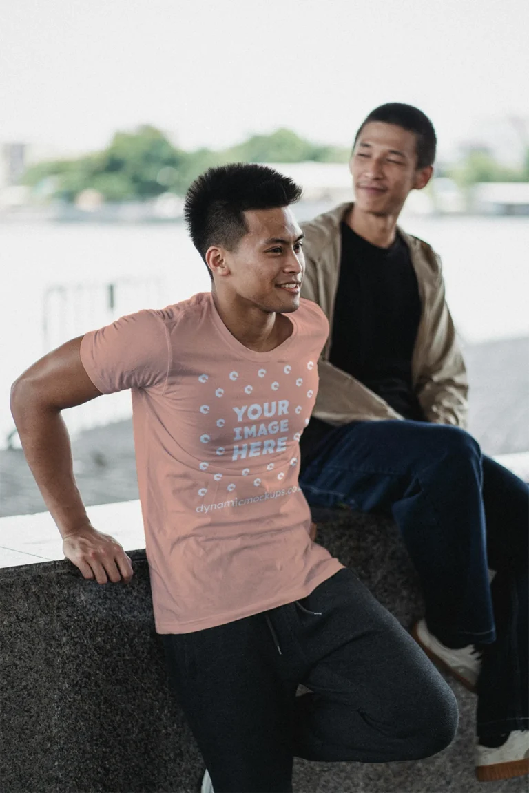 Man Wearing Peach T-shirt Mockup Front View Template