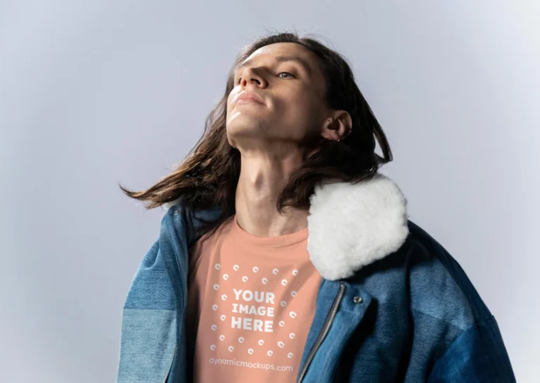 Man Wearing Peach T-shirt Mockup Front View Template