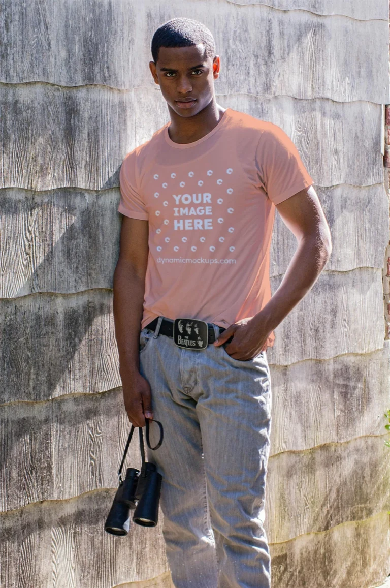 Man Wearing Peach T-shirt Mockup Front View Template