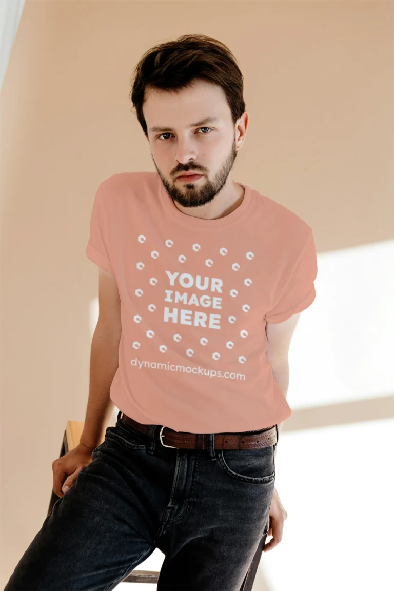 Man Wearing Peach T-shirt Mockup Front View Template