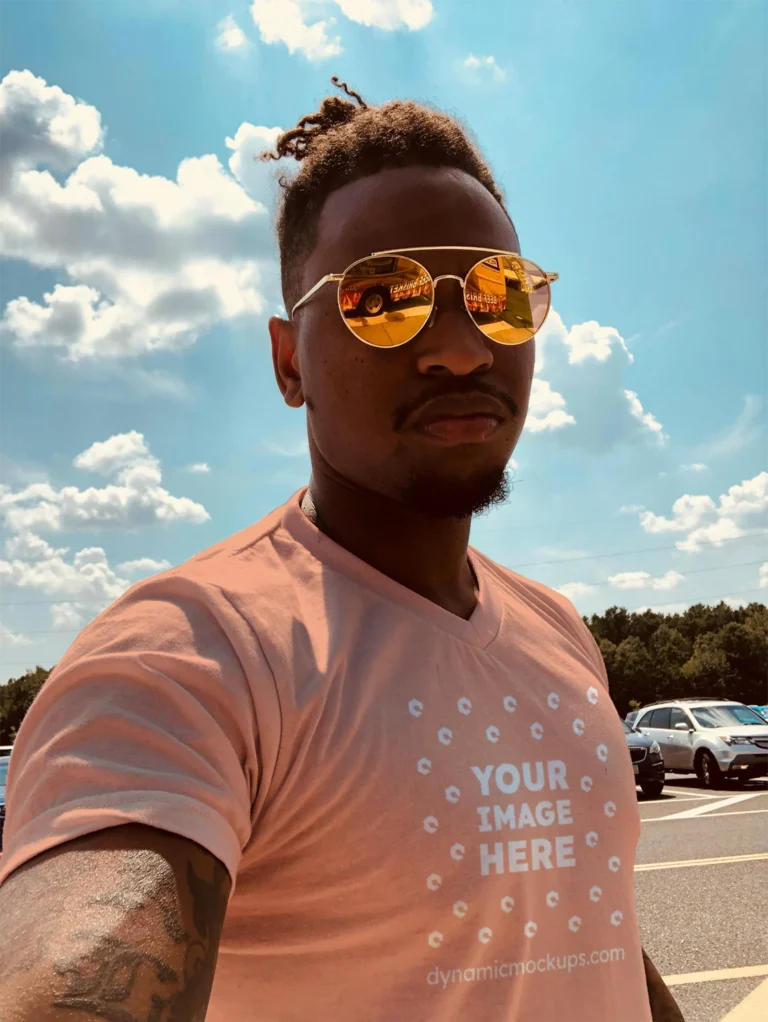 Man Wearing Peach T-shirt Mockup Front View Template