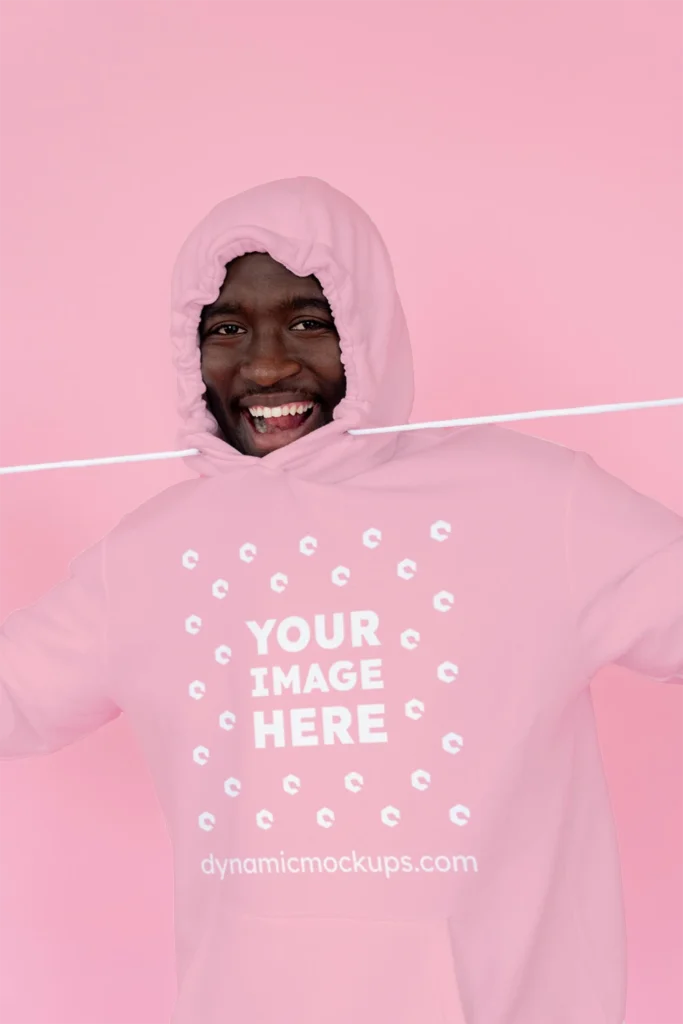 Man Wearing Pink Hoodie Mockup Front View Template