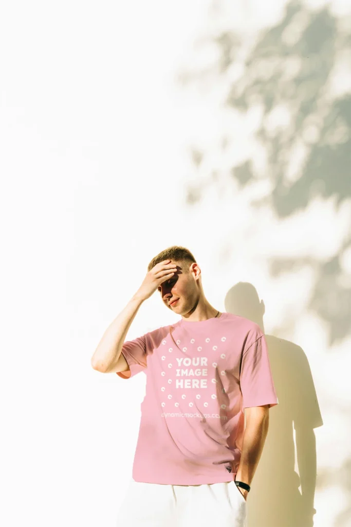 Man Wearing Pink T-shirt Mockup Front View Template