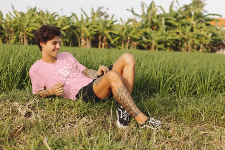 Man Wearing Pink T-shirt Mockup Front View Template