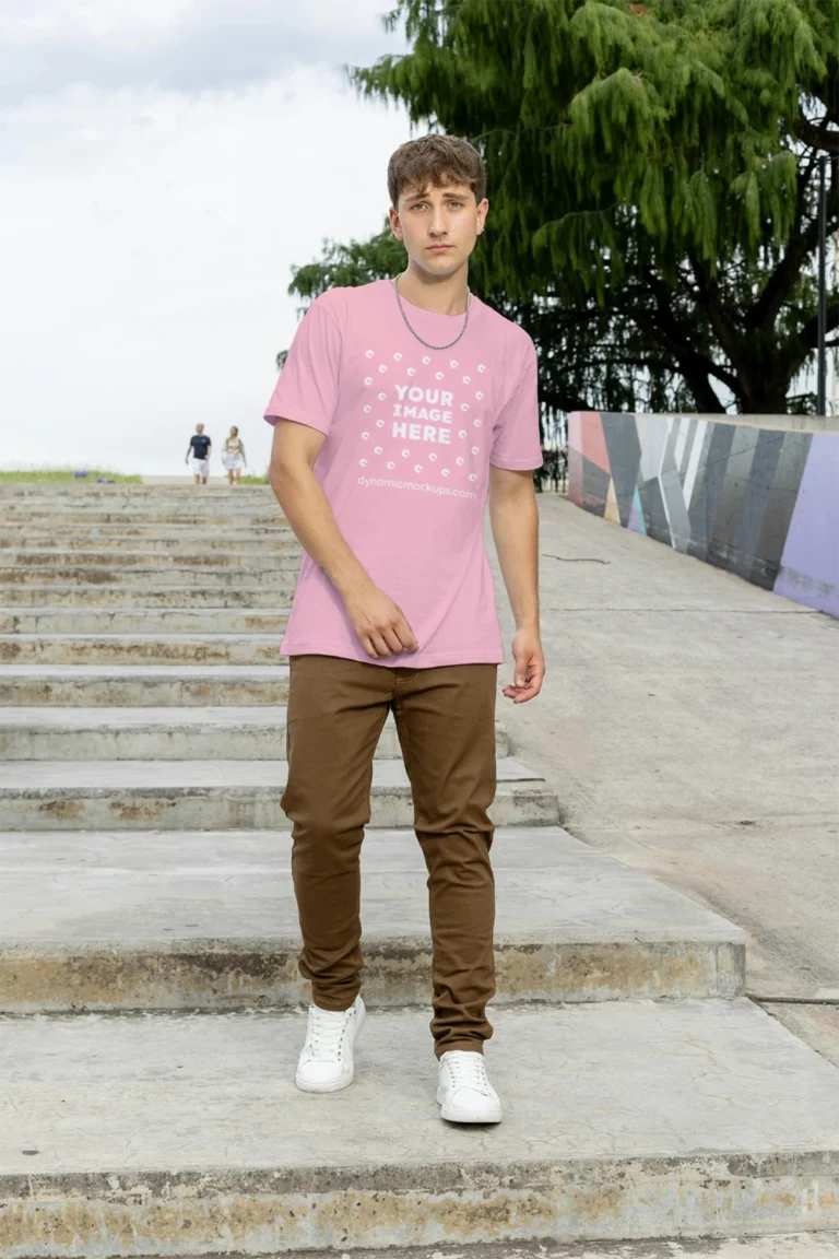 Man Wearing Pink T-shirt Mockup Front View Template