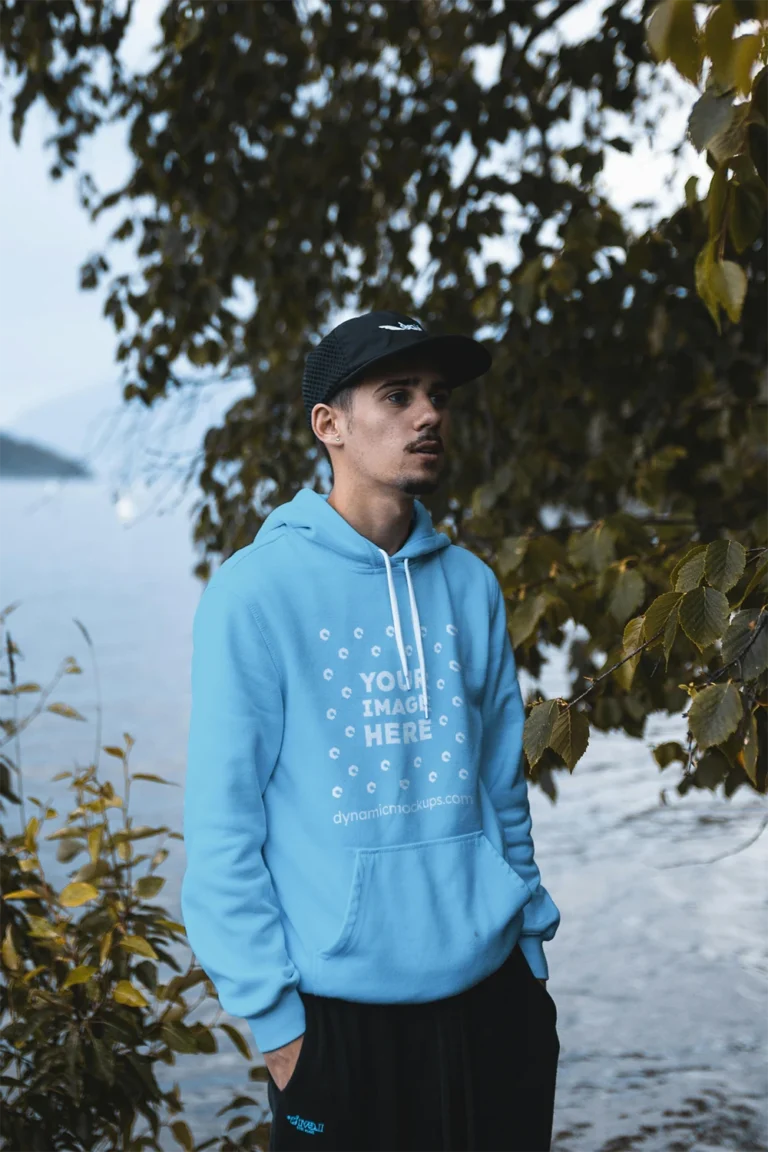 Man Wearing Sky Blue Hoodie Mockup Front View Template