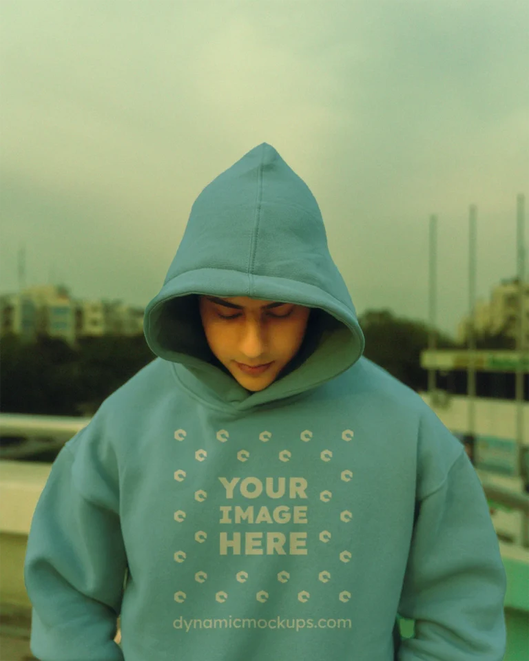 Man Wearing Sky Blue Hoodie Mockup Front View Template