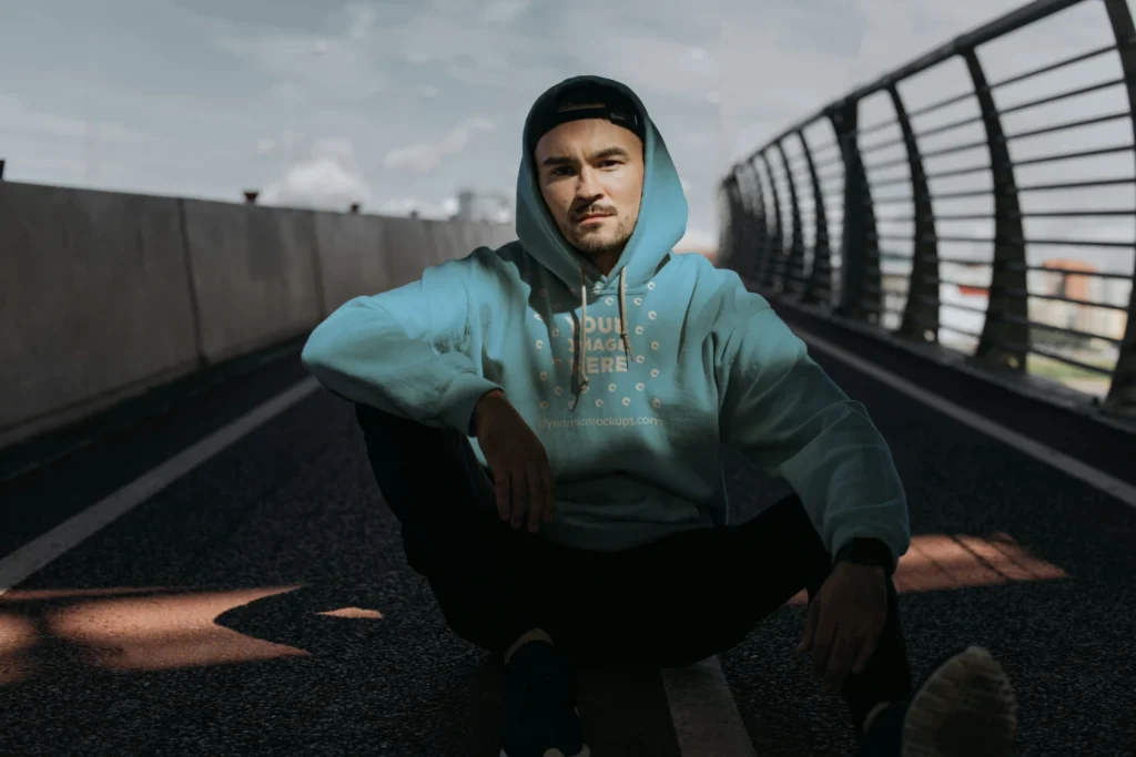 Man Wearing Sky Blue Hoodie Mockup Front View Template